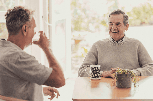 Retouched – Men at Table_Resized