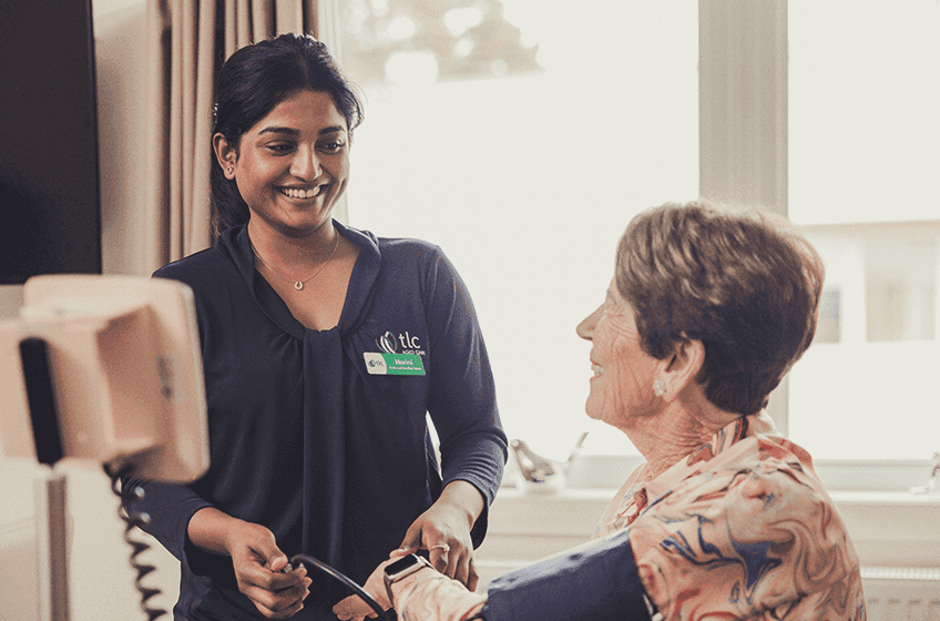 Student Helping Older Person